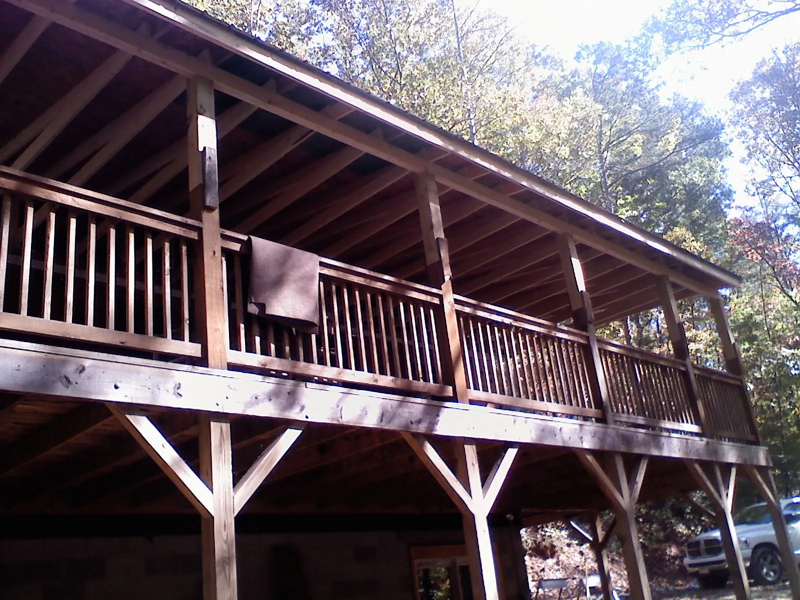 Timber framing under a new elevated porch and deck — Roof Leak Repair in Pinon Hills by Roofing Brothers